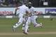 South African batsmen Hashim Amla, front, and Faf du Plessis run between the wickets during the fifth day of the second test cricket match between South Africa and Sri Lanka in Colombo, Sri Lanka, Monday, July 28, 2014. South Africa won the two-test series 1-0 after the second test was drawn Monday.(AP Photo/Sanka Gayashan)