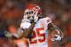 DENVER, CO - NOVEMBER 17: Jamaal Charles #25 of the Kansas City Chiefs carries the ball against the Denver Broncos at Sports Authority Field at Mile High on November 17, 2013 in Denver, Colorado. (Photo by Doug Pensinger/Getty Images)
