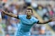 Manchester City's Sergio Aguero celebrates his goal during their English Premier League soccer match against Newcastle United at St James' Park, Newcastle, England, Sunday, Aug. 17, 2014. (AP Photo/Scott Heppell)