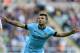 Manchester City's Sergio Aguero celebrates his goal during their English Premier League soccer match against Newcastle United at St James' Park, Newcastle, England, Sunday, Aug. 17, 2014. (AP Photo/Scott Heppell)
