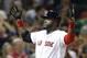 Boston Red Sox's David Ortiz celebrates his two-run home run during the third inning of a baseball game against the Houston Astros in Boston, Saturday, Aug. 16, 2014. (AP Photo/Michael Dwyer)