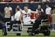 Atlanta Falcons' Sam Baker (72) leaves on a cart after he was injured during the second quarter of an NFL preseason football game against the Houston Texans, Saturday, Aug. 16, 2014, in Houston. (AP Photo/David J. Phillip)