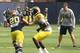 Drake Harris takes the handoff from Devin Gardner