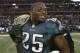 Dec 29, 2013; Arlington, TX, USA; Philadelphia Eagles running back LeSean McCoy (25) walks on the field after the game against the Dallas Cowboys with a belt at AT&T Stadium. The Eagle beat the Cowboys 24-22. Mandatory Credit: Tim Heitman-USA TODAY Sports