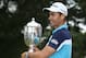 GREENSBORO, NC - AUGUST 17: Camilo Villegas of Colombia poses with the Sam Snead Cup after winning the Wyndham Championship at Sedgefield Country Club on August 17, 2014 in Greensboro, North Carolina. (Photo by Todd Warshaw/Getty Images)