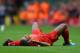 LIVERPOOL, ENGLAND - SEPTEMBER 01: Glen Johnson of Liverpool lies injured during the Barclays Premier League match between Liverpool and Manchester United at Anfield on September 01, 2013 in Liverpool, England. (Photo by Alex Livesey/Getty Images)