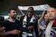 Soccer fans of Besiktas greet Demba Ba, a former Chelsea player from Senegal, at Ataturk Airport in Istanbul, Turkey, Wednesday, July 16, 2014. Ba will sign a three-year contract with Besiktas soccer club.(AP Photo/Emrah Gurel)