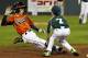 Pearland third baseman Presley Smith (7) tags out Cumberland's CJ Davock attempting to steal third to end the third inning of a baseball game in United States pool play at the Little League World Series tournament in South Williamsport, Pa., Friday, Aug. 15, 2014. (AP Photo/Gene J. Puskar)
