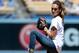 LOS ANGELES, CA - AUGUST 17: Jessica Alba throws out the ceremonial first pitch before the game between the Milwaukee Brewers and the Los Angeles Dodgers at Dodger Stadium on August 17, 2014 in Los Angeles, California. (Photo by Harry How/Getty Images)