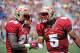 Apr 12, 2014; Tallahassee, FL, USA; Florida State Seminoles quarterback Jameis Winston (5) congratulates fullback Freddie Stevenson (23) after a touchdown during the spring game at Doak Campbell Stadium. Mandatory Credit: Melina Vastola-USA TODAY Sports