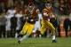 LOS ANGELES, CA - NOVEMBER 16: Quarterback Cody Kessler #6 of the USC Trojans hands the ball off to running back Javorius Allen #37 against the Stanford Cardinal at Los Angeles Coliseum on November 16, 2013 in Los Angeles, California. (Photo by Jeff Gross/Getty Images)