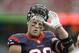 Houston Texans' J.J. Watt before an NFL preseason football game against the Atlanta Falcons, Saturday, Aug. 16, 2014, in Houston. (AP Photo/Patric Schneider)