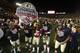 Florida State players celebrate after defeating Auburn University in the 2014 BCS Championship NCAA College Football game on Monday, Jan. 6, 2014 in Pasadena, Calif. Florida State defeated Auburn 34-31. (AP Photo/Doug Benc)