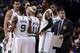 Boston Celtics head coach Brad Stevens, right, with his team during a timeout in the first quarter of an NBA basketball game against the Chicago Bulls in Boston, Sunday, March 30, 2014. (AP Photo/Michael Dwyer)