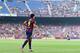 BARCELONA, SPAIN - AUGUST 18: Luis Suarez of FC Barcelona walks onto the pitch during the official presentation of the FC Barcelona team prior to the Joan Gamper Trophy match between FC Barcelona and Club Leon at Camp Nou on August 18, 2014 in Barcelona, Spain. (Photo by David Ramos/Getty Images)