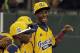 Chicago's Pierce Jones, right, walks off the field with teammates after a 8-7 win over Cumberland in an elimination baseball game at the Little League World Series tournament in South Williamsport, Pa., Monday, Aug. 18, 2014. (AP Photo/Gene J. Puskar)