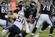 New England Patriots defensive end Rob Ninkovich (50) chases Philadelphia Eagles quarterback Nick Foles (9)in the first half of an NFL preseason football game Friday, Aug. 15, 2014, in Foxborough, Mass. (AP Photo/Charles Krupa)