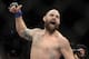 Travis Browne, of Albuquerque, N.M., reacts after defeating Josh Barnett, of Fullerton, Calif. ,during a UFC 168 mixed martial arts heavyweight bout on Saturday, Dec. 28, 2013, in Las Vegas. Browne won by a knockout in the first round. (AP Photo/David Becker)