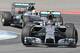 Mercedes driver Nico Rosberg, front, of Germany followed by Mercedes Formula One driver Lewis Hamilton of Great Britain steers his car to clock the fastest time during the qualification at the German Formula One Grand Prix in Hockenheim, Germany, Saturday, July 19, 2014. The German Grand Prix will be held on Sunday, July 20, 2014. (AP Photo/Jens Meyer)