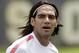 AS Monaco FC forward Radamel Falcao looks to the stands as he warms up for preseason soccer training practice in Miami, Monday, July 21, 2014. AS Monaco FC will face Atletico Nacional, of Colombia, on July 23 in Miami. (AP Photo/Alan Diaz)