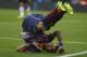 FC Barcelona's Dani Alves, from Brazil, falls down during a Spanish La Liga soccer match against Valencia at the Camp Nou stadium in Barcelona, Spain, Saturday, Feb. 1, 2014. (AP Photo/Manu Fernandez)