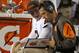 Cleveland Browns quarterback Johnny Manziel (2) talks with offensive coordinator Kyle Shanahan during the second half of an NFL preseason football game against the Washington Redskins Monday, Aug. 18, 2014, in Landover, Md. (AP Photo/Evan Vucci)
