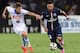 NAPLES, ITALY - AUGUST 11: Jorginho of Napoli and Ezequiel Lavezzi of Paris Saint Germain in action during the pre-season friendly match between SSC Napoli and Paris Saint-Germain FC at Stadio San Paolo on August 11, 2014 in Naples, Italy. (Photo by Giuseppe Bellini/Getty Images)