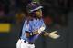 Philadelphia's Mo'ne Davis celebrates as she stands on second during the first inning of a baseball game against Pearland in United States pool play at the Little League World Series tournament in South Williamsport, Pa., Sunday, Aug. 17, 2014. (AP Photo/Gene J. Puskar
