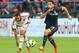 TORONTO, ON - JULY 24: Giampaolo Pazzini #11 of AC Milan chases the ball against Kostas Manolas #24 of Olympiacos FC during International Champions Cup 2014 action at BMO Field July 24, 2014 in Toronto, Ontario, Canada. (Photo by Abelimages/Getty Images)