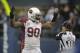Arizona Cardinals defensive end Darnell Dockett (90) reacts after a play in the second half of an NFL football game against the Seattle Seahawks, Sunday, Dec. 22, 2013, in Seattle. (AP Photo/Stephen Brashear)