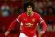 MANCHESTER, ENGLAND - AUGUST 12: Marouane Fellaini of Manchester United in action during the Pre Season Friendly match between Manchester United and Valencia at Old Trafford on August 12, 2014 in Manchester, England. (Photo by Clive Brunskill/Getty Images)