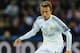 CARDIFF, WALES - AUGUST 12: Real Madrid player Luka Modric in action during the UEFA Super Cup match between Real Madrid and Sevilla FC at Cardiff City Stadium on August 12, 2014 in Cardiff, Wales. (Photo by Stu Forster/Getty Images)