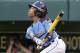 Philadelphia's Mo'ne Davis drives in a run with a single to right field off Pearland pitcher Clayton Broeder during the first inning of a baseball game in United States pool play at the Little League World Series tournament in South Williamsport, Pa., Sunday, Aug. 17, 2014. (AP Photo/Gene J. Puskar