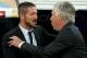 MADRID, SPAIN - AUGUST 19: head coach Diego Pablo Simeone (L) of Atletico de Madrid is greeted by head coach Carlo Ancelotti (R) of Real Madrid CF prior to start the Supercopa first leg match between Real Madrid and Club Atletico de Madrid at Estadio Santiago Bernabeu on August 19, 2014 in Madrid, Spain. (Photo by Gonzalo Arroyo Moreno/Getty Images)
