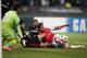 Besiktas's Pedro Franco, center, and Olivier Giroud of Arsenal, right, fight for the ball during their Champions League play-off first leg soccer match in Istanbul, Turkey, Tuesday, Aug. 19, 2014. (AP Photo)