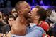 Kell Brook, left, celebrates his win against Shawn Porter during the IBF welterweight title boxing bout Saturday, Aug. 16, 2014, in Carson, Calif. (AP Photo/Chris Carlson)