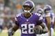 Minnesota Vikings running back Adrian Peterson (28) warms up before an NFL preseason football game against the Arizona Cardinals, Saturday, Aug. 16, 2014, in Minneapolis. (AP Photo/Ann Heisenfelt)