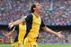 BARCELONA, SPAIN - MAY 17: Diego Godin of Club Atletico de Madrid celebrates after scoring his goal during the La Liga match between FC Barcelona and Club Atletico de Madrid at Camp Nou on May 17, 2014 in Barcelona, Spain. (Photo by Alex Livesey/Getty Images)