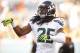 Aug 7, 2014; Denver, CO, USA; Seattle Seahawks cornerback Richard Sherman (25) warms up before the preseason game against the Denver Broncos at Sports Authority Field at Mile High. Mandatory Credit: Chris Humphreys-USA TODAY Sports
