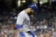 Toronto Blue Jays' Jose Bautista looks down after striking out against the Houston Astros during the eighth inning of a baseball game Friday, Aug. 1, 2014, in Houston. (AP Photo/David J. Phillip)