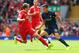 LIVERPOOL, ENGLAND - AUGUST 17: Dusan Tadic of Southampton takes on Lucas Leiva of Liverpool during the Barclays Premier League match between Liverpool and Southampton at Anfield on August 17, 2014 in Liverpool, England. (Photo by Alex Livesey/Getty Images)