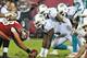 The Miami Dolphins have asked Dion Jordan (95, above) to put his hands in the ground, but might they be better off having him move around?