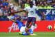 LEICESTER, ENGLAND - AUGUST 16: Romelu Lukaku of Everton is tackled by Liam Moore of Leicester City during the Barclays Premier League match between Leicester City and Everton at the King Power Stadium on August 16, 2014 in Leicester, England. (Photo by Michael Regan/Getty Images)