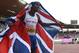 Britain's Mo Farah celebrates winning the gold medal in the men's 5000m final during the European Athletics Championships in Zurich, Switzerland, Sunday, Aug. 17, 2014. (AP Photo/Martin Meissner)