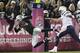 Oakland Raiders cornerback Charles Woodson (24) dives past San Diego Chargers quarterback Philip Rivers to score a touchdown on a fumble recovery during the third quarter of an NFL football game in Oakland, Calif., Sunday, Oct. 6, 2013. (AP Photo/Tony Avelar)