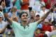 Roger Federer, from Switzerland, celebrates after defeating David Ferrer, from Spain, 6-3, 1-6, 6-2, in a final match at the Western and Southern Open tennis tournament, Sunday, Aug. 17, 2014, in Mason, Ohio. (AP Photo/Al Behrman)