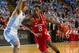 Feb 1, 2014; Chapel Hill, NC, USA; North Carolina State Wolfpack guard Anthony Barber (2) dribbles as North Carolina Tar Heels guard Marcus Paige (5) defends in the first half at Dean E. Smith Student Activities Center. Mandatory Credit: Bob Donnan-USA TODAY Sports