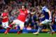 LIVERPOOL, ENGLAND - APRIL 06: Seamus Coleman of Everton competes with Tomas Rosicky of Arsenal during the Barclays Premier League match between Everton and Arsenal at Goodison Park on April 6, 2014 in Liverpool, England. (Photo by Laurence Griffiths/Getty Images)