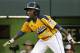 Chicago's Joshua Houston watches his ground out that drove in a run off Pearland pitcher Walter Maeker III in the first inning inning of an elimination baseball game at the Little League World Series in South Williamsport, Pa., Tuesday, Aug. 19, 2014. (AP Photo/Gene J. Puskar