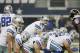 Dallas Cowboys quarterback Tony Romo in action during the first half of an NFL preseason football game against the Baltimore Ravens Saturday, Aug. 16, 2014, in Arlington, Texas. (AP Photo/Brandon Wade)